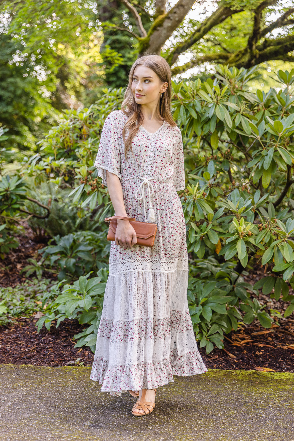 Ditsy Floral and Lace Tiered Maxi with Side Slit, Pockets, and Tie Waist.