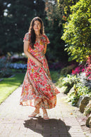 Floral Maxi Dress with Pleated Waist and Pockets.