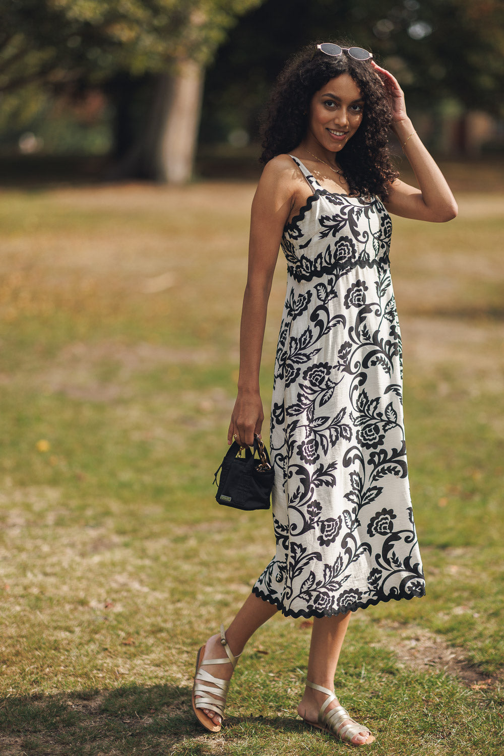 Floral Printed Sleeveless Dress with Rick Rack Trim, Smocked Back and Pockets