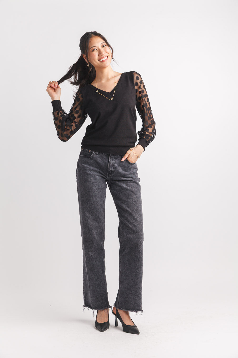 Sweater with dot sleeves